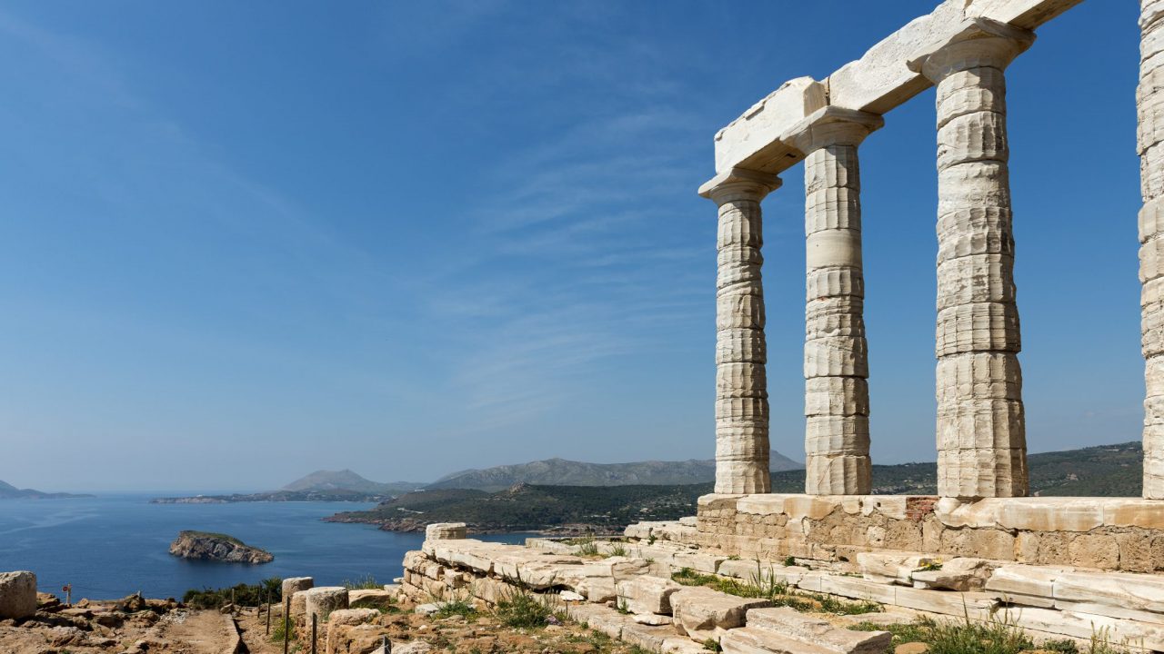 Temple of Poseidon against a backdrop of the Aegean sea, part of the Cape Sounion Private Tour from Athens with Discover Greek Culture