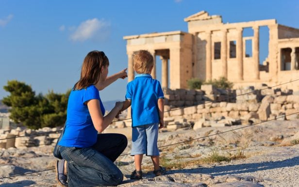 Mother and son gazing upon the temple of the Acropolis during the Athens Acropolis Family Tour Half day with Discover Greek Culture